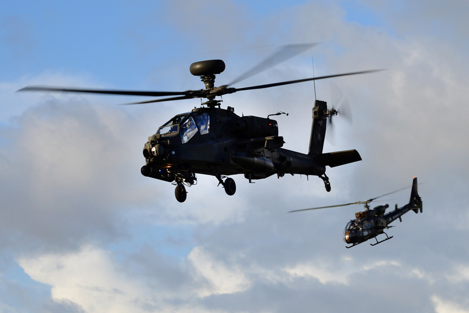 An Apache and a Gazelle helicopter