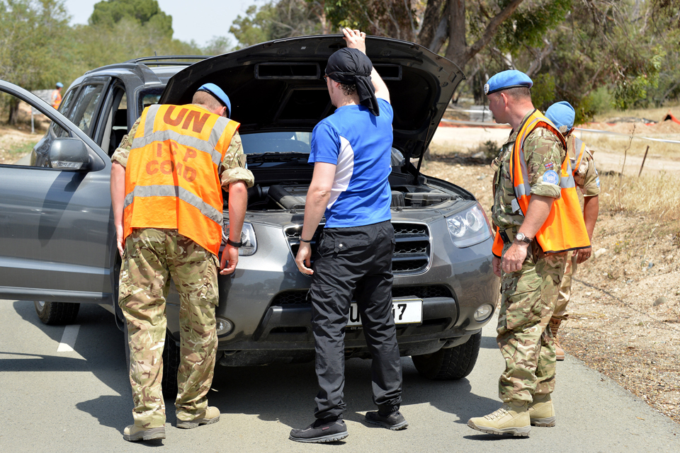 Army reservists conduct a vehicle check