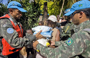 UN Peacekeepers distributing food rations in Haiti