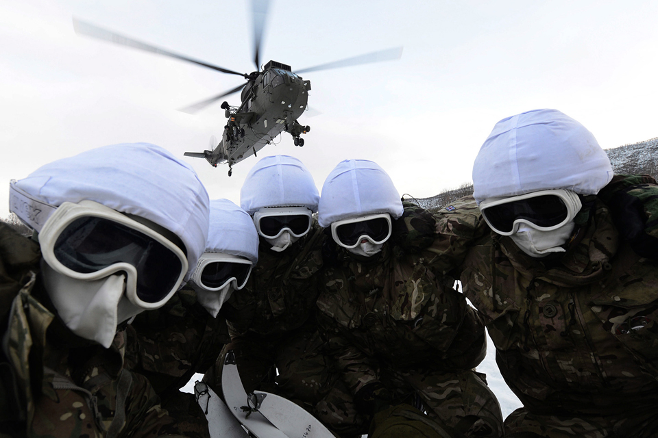 Royal Marines conducting a helicopter embarkation drill