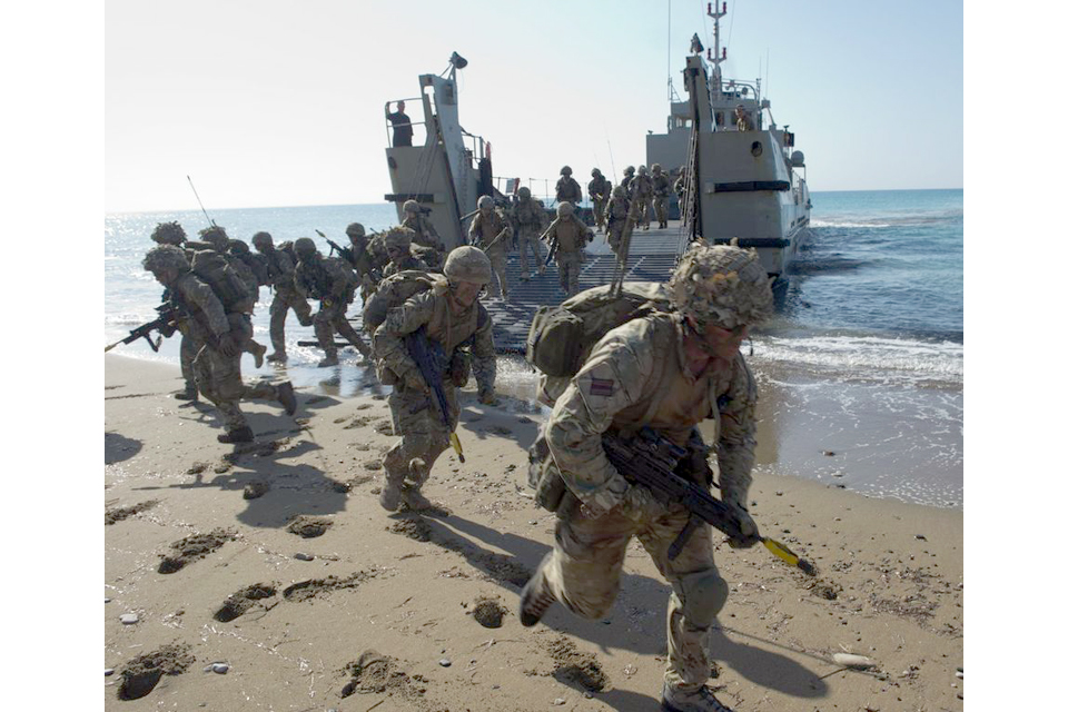 Riflemen taking part in a beach landing during Exercise Lion Star 3