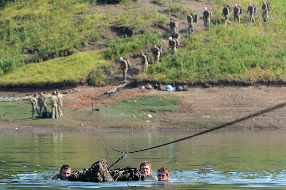 Royal Marines from 42 Commando taking part in a river crossing