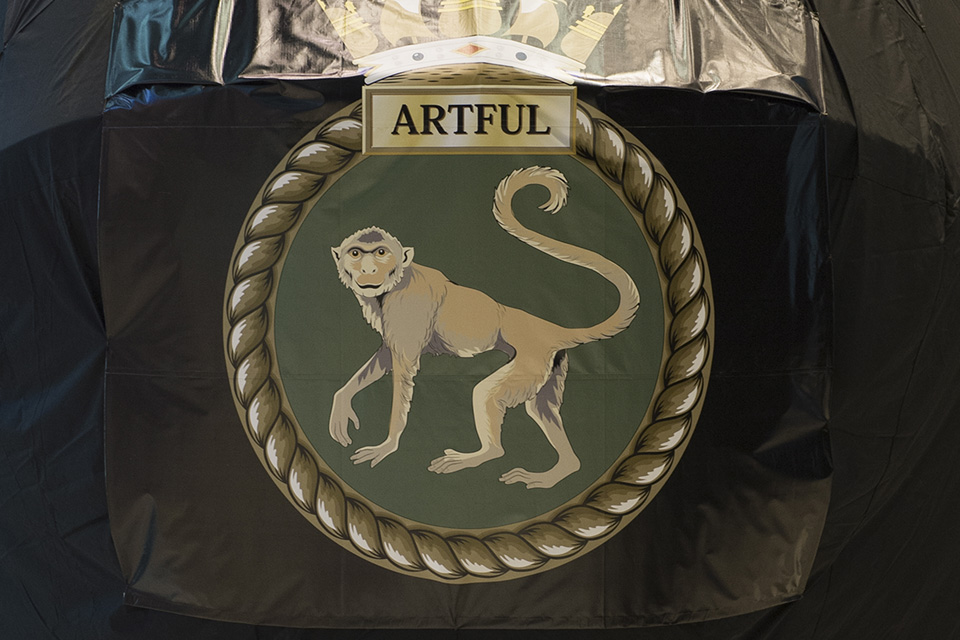 Artful's crest shows an unspecified species of primate