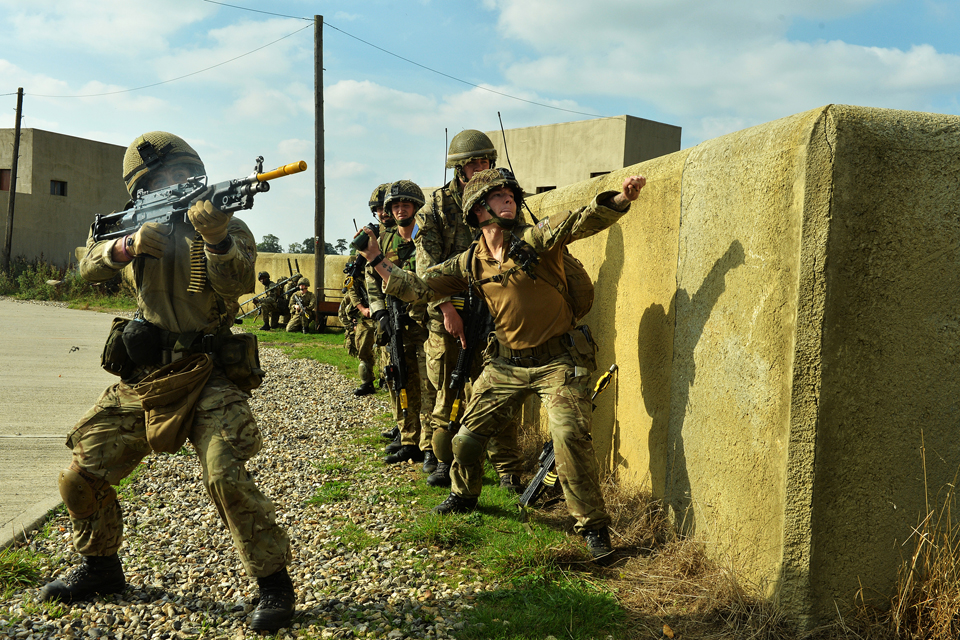 Paratroopers launch an assault on a compound