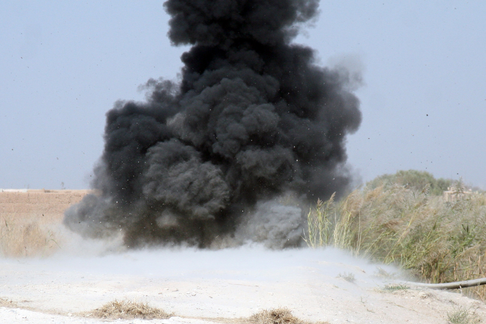 The controlled explosion of a roadside bomb