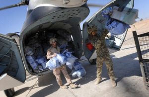 Troops at Camp Bastion in Afghanistan unload bags of Christmas mail from the UK (library image) [Picture: Corporal Mike O'Neill, Crown copyright]