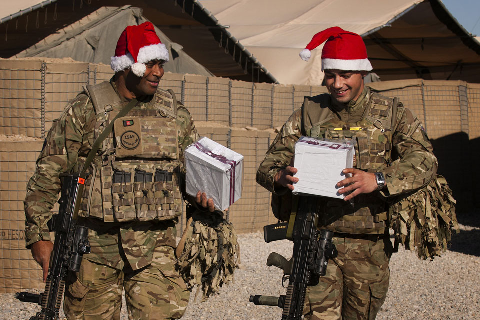 British soldiers with their uk4u Thanks! Christmas boxes