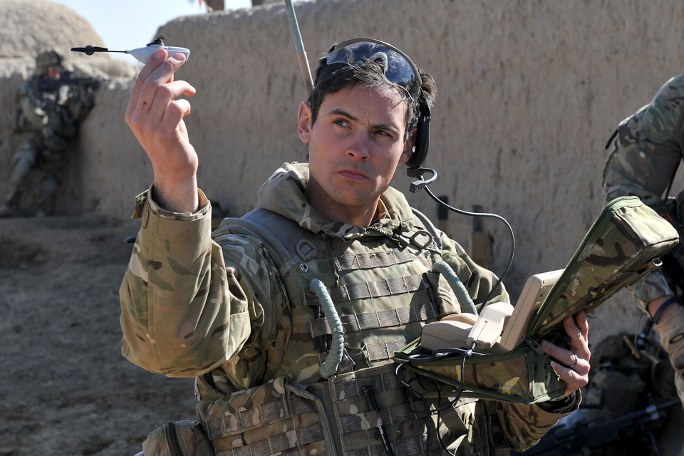 Soldier with a Black Hornet nano unmanned aerial system