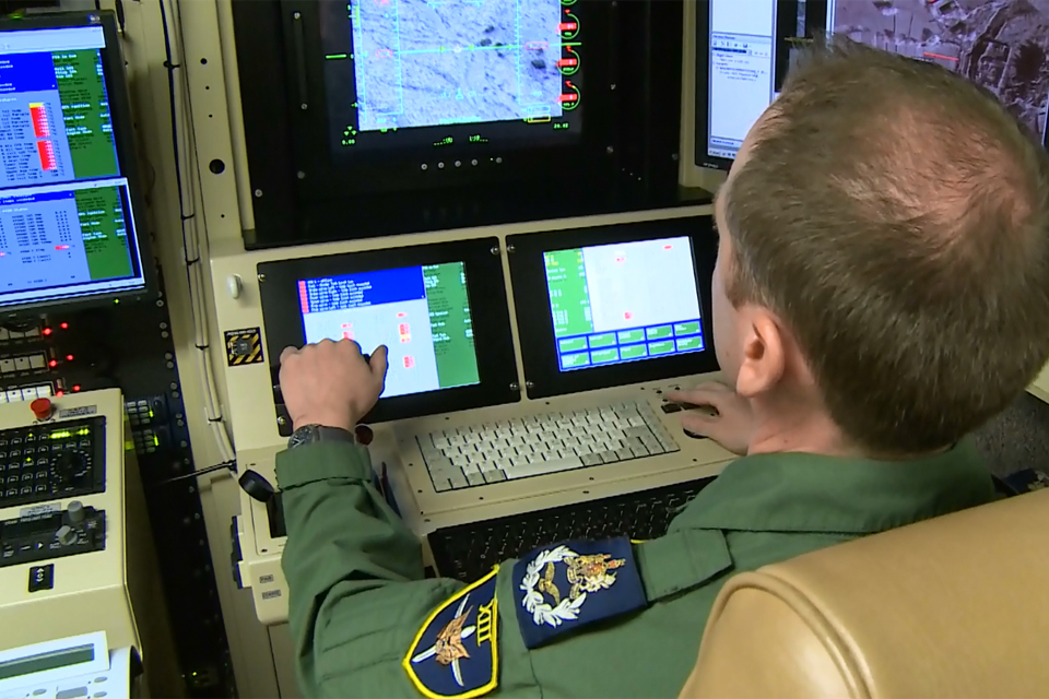 A pilot from 13 Squadron remotely controls a Reaper aircraft