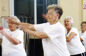 A few elderly ladies exercising