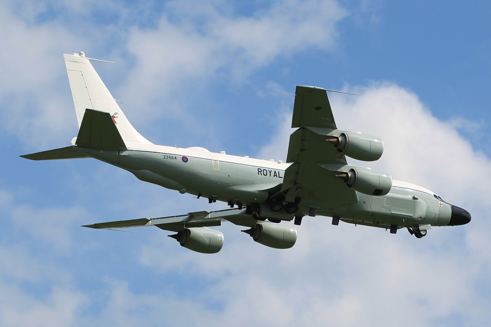 A Rivet Joint RC-135W aircraft in flight over RAF Waddington