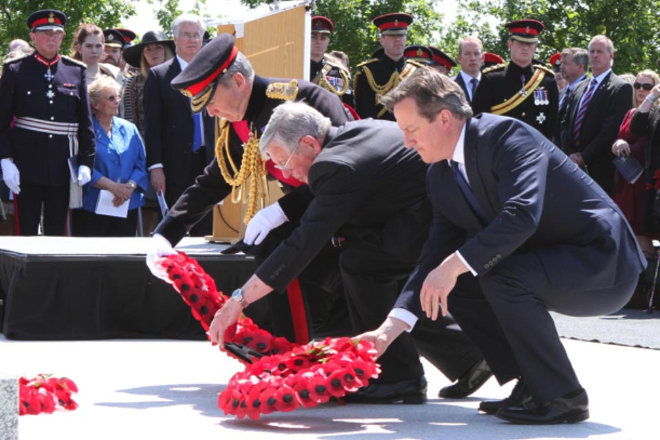 The Prime Minister David Cameron, The Chief of Defence Staff General Sir Nicholas Houghton and Mr Peter Andrews, father of Flight Sergeant Gary Andrews, 120 Squadron, Royal Air Force lay wreaths at the memorial