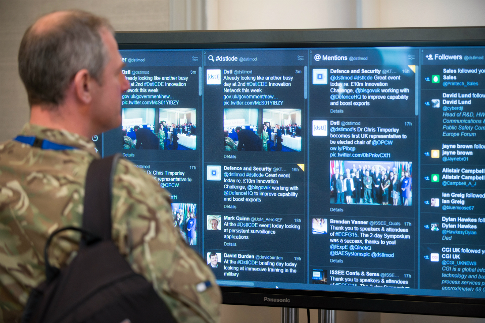 Military Advisor viewing social media screen.