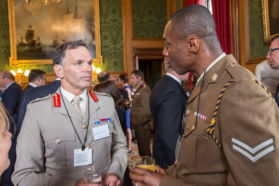 Chief of Defence People, Lieutenant General Andrew Gregory with Corporal Emmanuel Ottih from 2 Medical Regiment.  