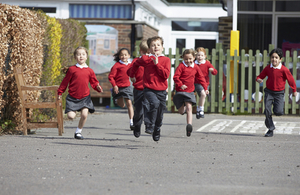 Primary school children running in the playground
