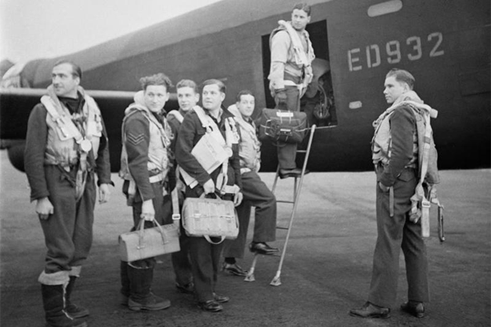 The World War II 617 Squadron Dambusters with a Lancaster bomber aircraft at Royal Air Force Scampton, 16 May 1943.     