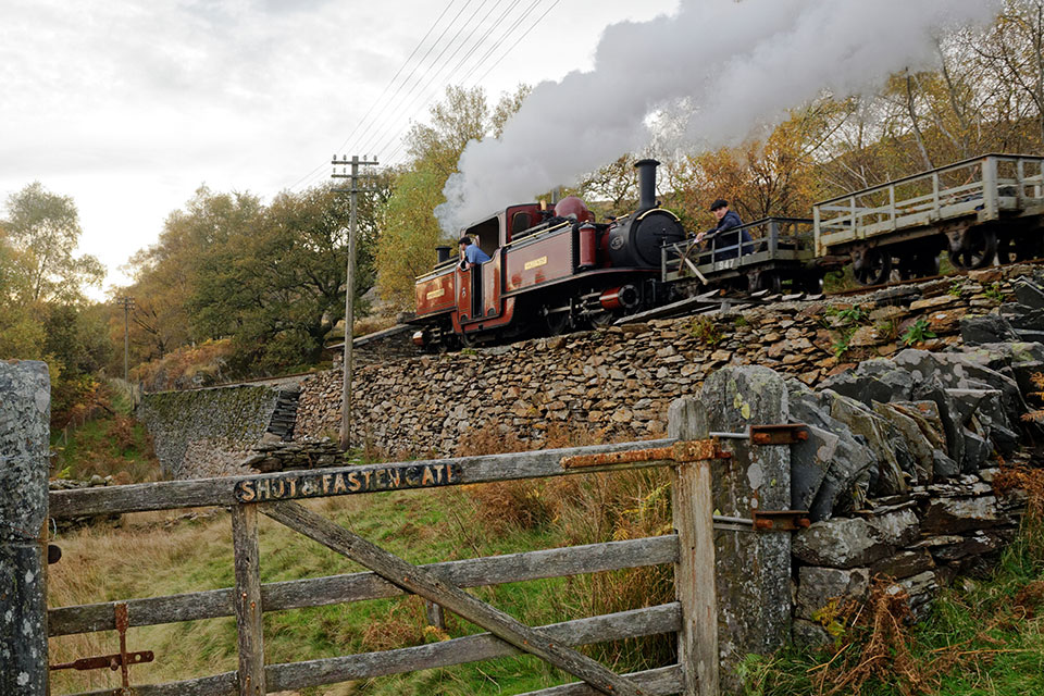 Steam train travelling in Wales.
