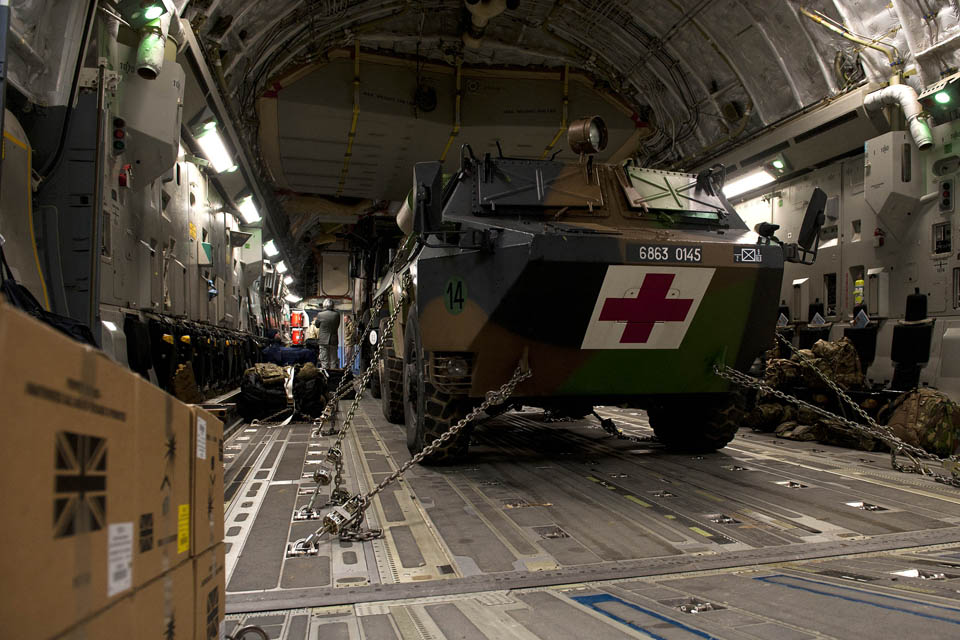 French military equipment in the cargo hold of a Royal Air Force C-17 transport aircraft