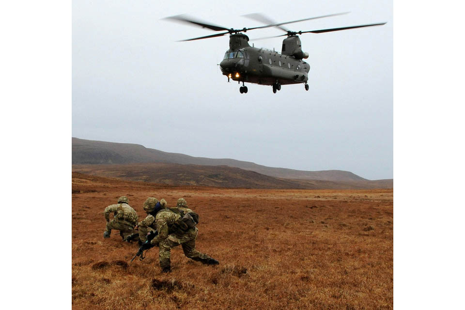 Royal Marines being inserted into the field by an RAF Chinook